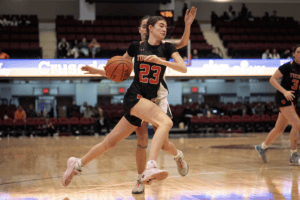Chloe Angello drives towards the hoop against Pleasantville.